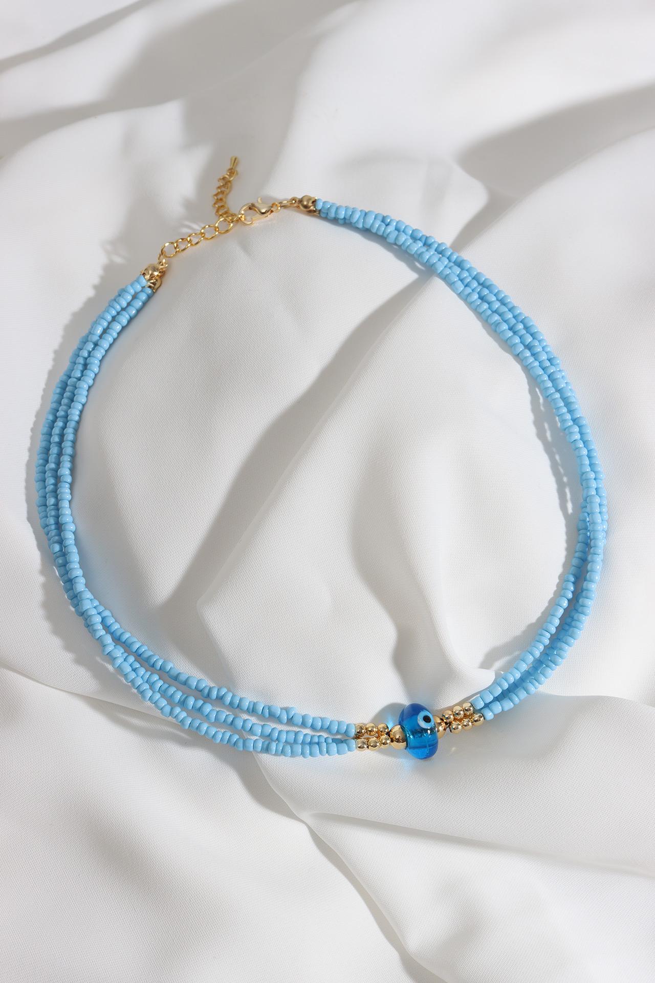 Колье из синих бусин со сглазом
Колье из синих бусин со сглазом