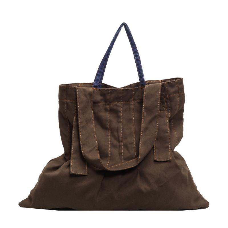 Ледачий вітер великої місткості плісирована полотняна сумка 2024 нова ретро сумка сумка текстура ніша дизайн сумка через плече темно-коричневого кольору
Ледачий вітер великої місткості плісирована полотняна сумка 2024 нова ретро сумка сумка текстура ніша дизайн сумка через плече темно-коричневого кольору