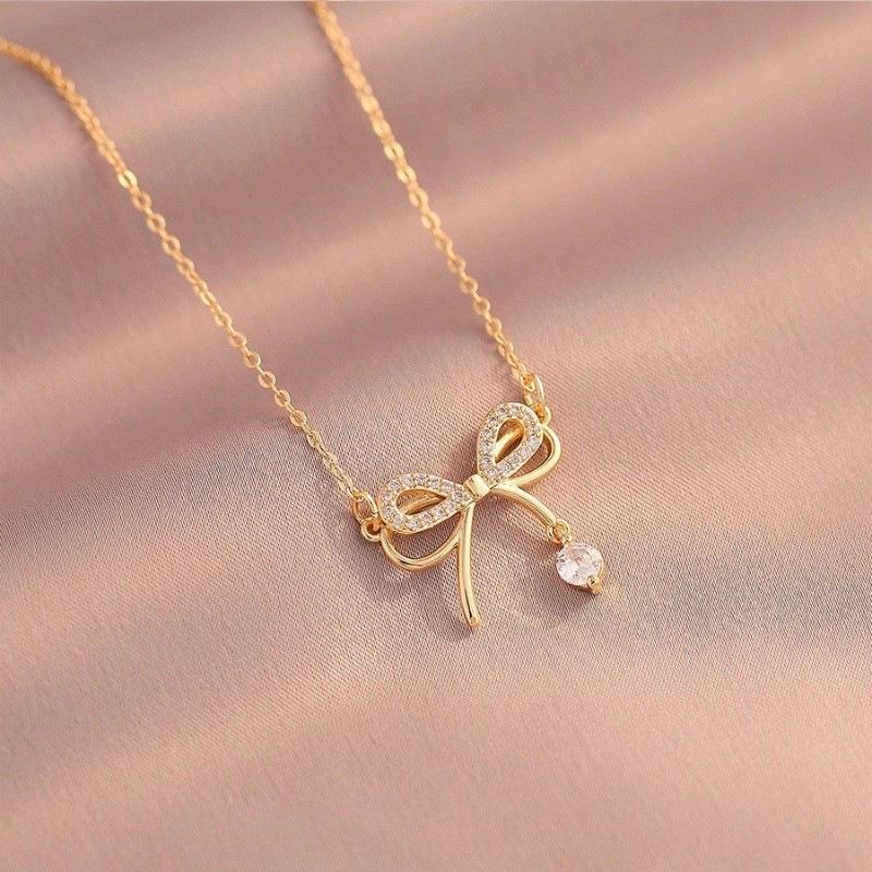 Fan Family Double-Layer Bow Necklace: Elegant Micro-Paved Full Diamond Design for a Chic, Versatile Look and Celebrity Style.
Fan Family Double-Layer Bow Necklace: Elegant Micro-Paved Full Diamond Design for a Chic, Versatile Look and Celebrity Style.