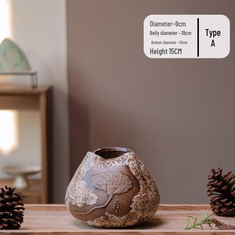 Керамічна ваза в стилі вабі-сабі з лотосовим коробочком: Нова прикраса з сушених квітів у китайському стилі
Керамічна ваза в стилі вабі-сабі з лотосовим коробочком: Нова прикраса з сушених квітів у китайському стилі