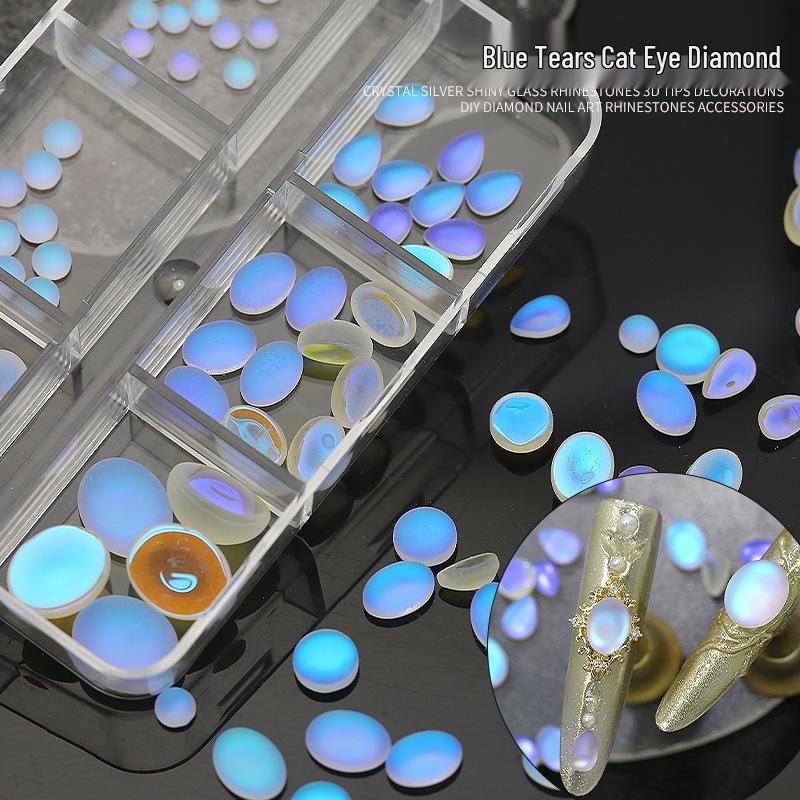 Blue Teardrop Cat Eye Frosted Nail Art Jewels - Oval Flat Back Gemstones for DIY Nail Decoration.
Blue Teardrop Cat Eye Frosted Nail Art Jewels - Oval Flat Back Gemstones for DIY Nail Decoration.