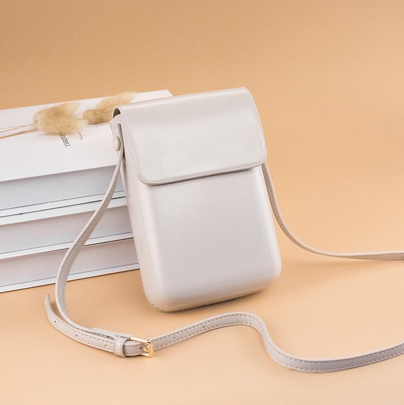 2025 Spring/Summer Versatile Vertical Coin Purse: Japanese/Korean Retro Crossbody Bag with Large Capacity for Phone Storage. серый/белый
2025 Spring/Summer Versatile Vertical Coin Purse: Japanese/Korean Retro Crossbody Bag with Large Capacity for Phone Storage. серый/белый