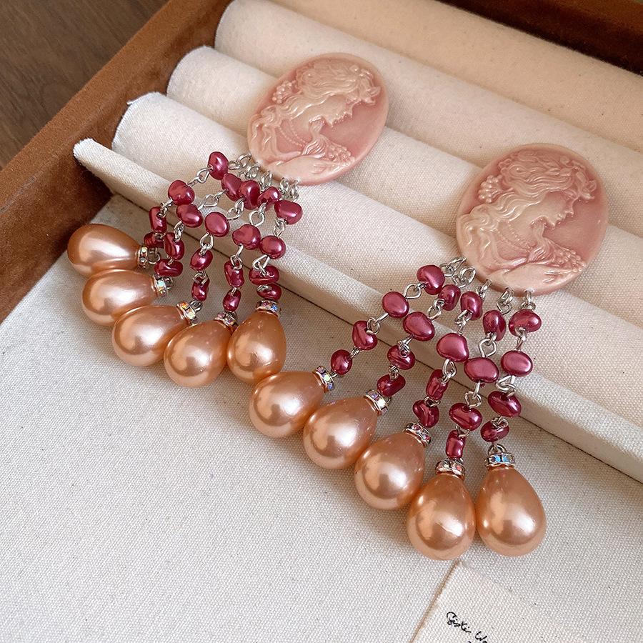 Medieval vintage silver needle oval pearl fringed earrings simple fashion stud earrings light luxury high-end earrings
Medieval vintage silver needle oval pearl fringed earrings simple fashion stud earrings light luxury high-end earrings