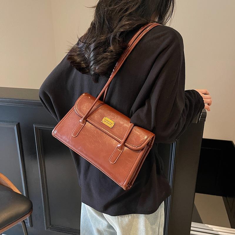 Retro niche commuter underarm bag women s 2025 new fashion shoulder bag simple and versatile handbag 27*7*16 коричневий
Retro niche commuter underarm bag women s 2025 new fashion shoulder bag simple and versatile handbag 27*7*16 коричневий