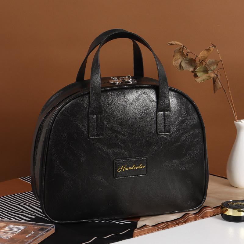 Oil wax leather portable cosmetic bag portable toilet bag makeup brush cosmetics travel storage bag
Oil wax leather portable cosmetic bag portable toilet bag makeup brush cosmetics travel storage bag