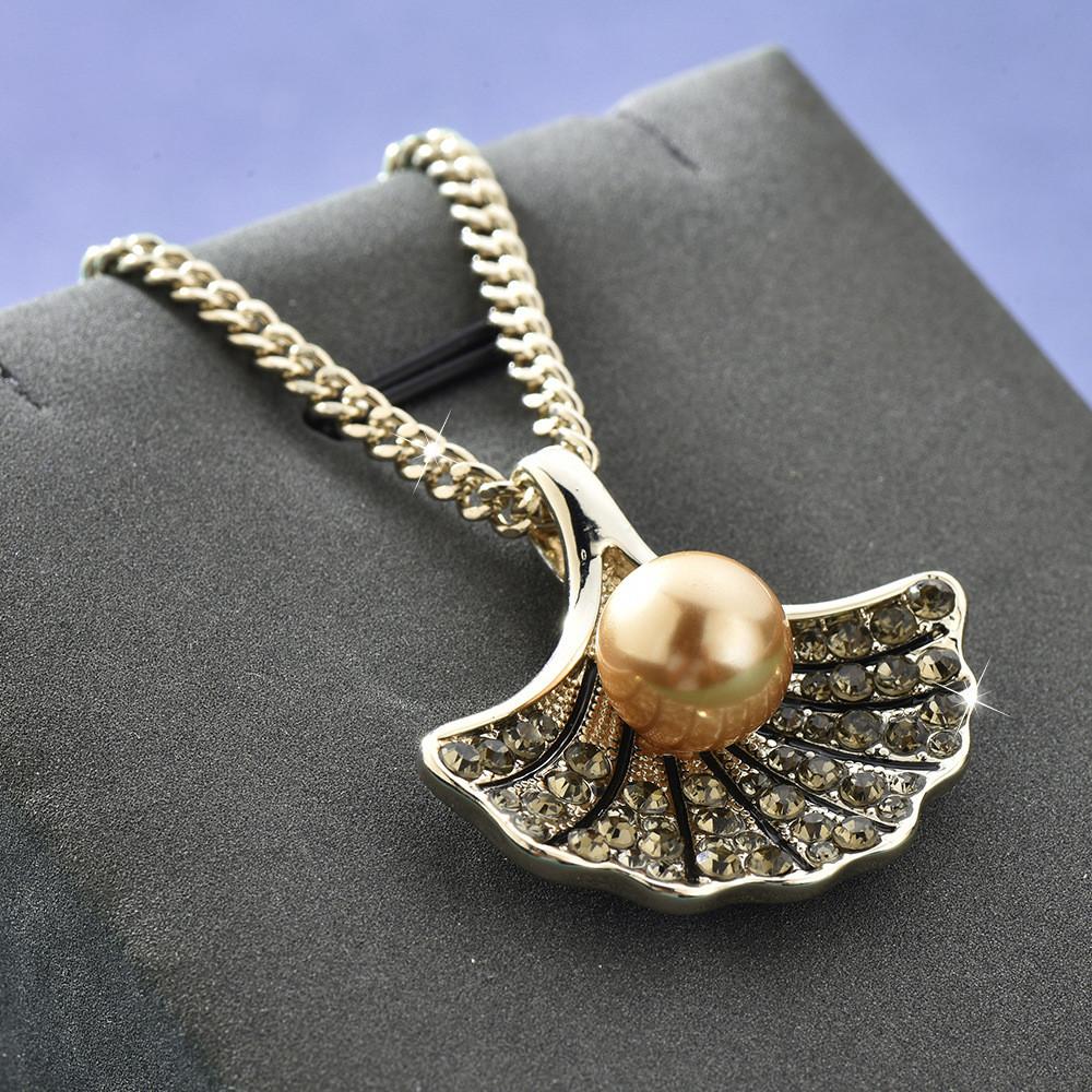 Элегантное ожерелье из жемчуга и ракушек для женщин в стильном кофейно-золотом цвете для осенней и зимней моды
Элегантное ожерелье из жемчуга и ракушек для женщин в стильном кофейно-золотом цвете для осенней и зимней моды