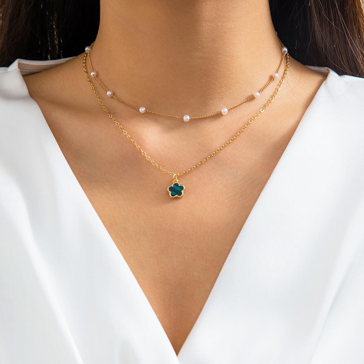 Accessories, temperament colored five-leaf flower necklace women, simple imitation pearl beaded flower necklace
Accessories, temperament colored five-leaf flower necklace women, simple imitation pearl beaded flower necklace