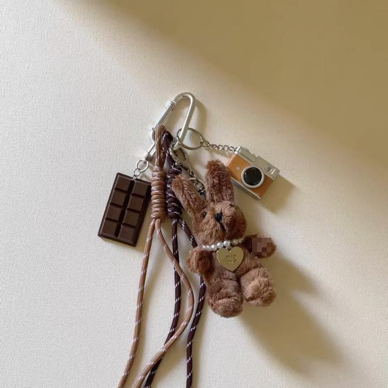 Нейлоновый брелок «Кролик и щенок» с подвеской в виде камеры
Нейлоновый брелок «Кролик и щенок» с подвеской в виде камеры