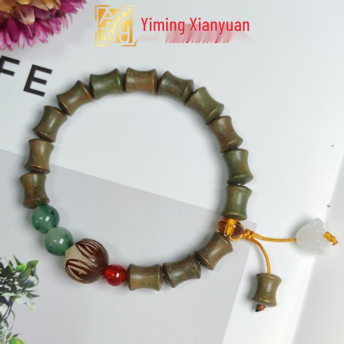 Yi Ming Xian Yuan Lotus Pod Green Sandalwood Beaded Bracelet | Bamboo Joint Design | New Chinese Couple Style Prayer Bracelet
Yi Ming Xian Yuan Lotus Pod Green Sandalwood Beaded Bracelet | Bamboo Joint Design | New Chinese Couple Style Prayer Bracelet
