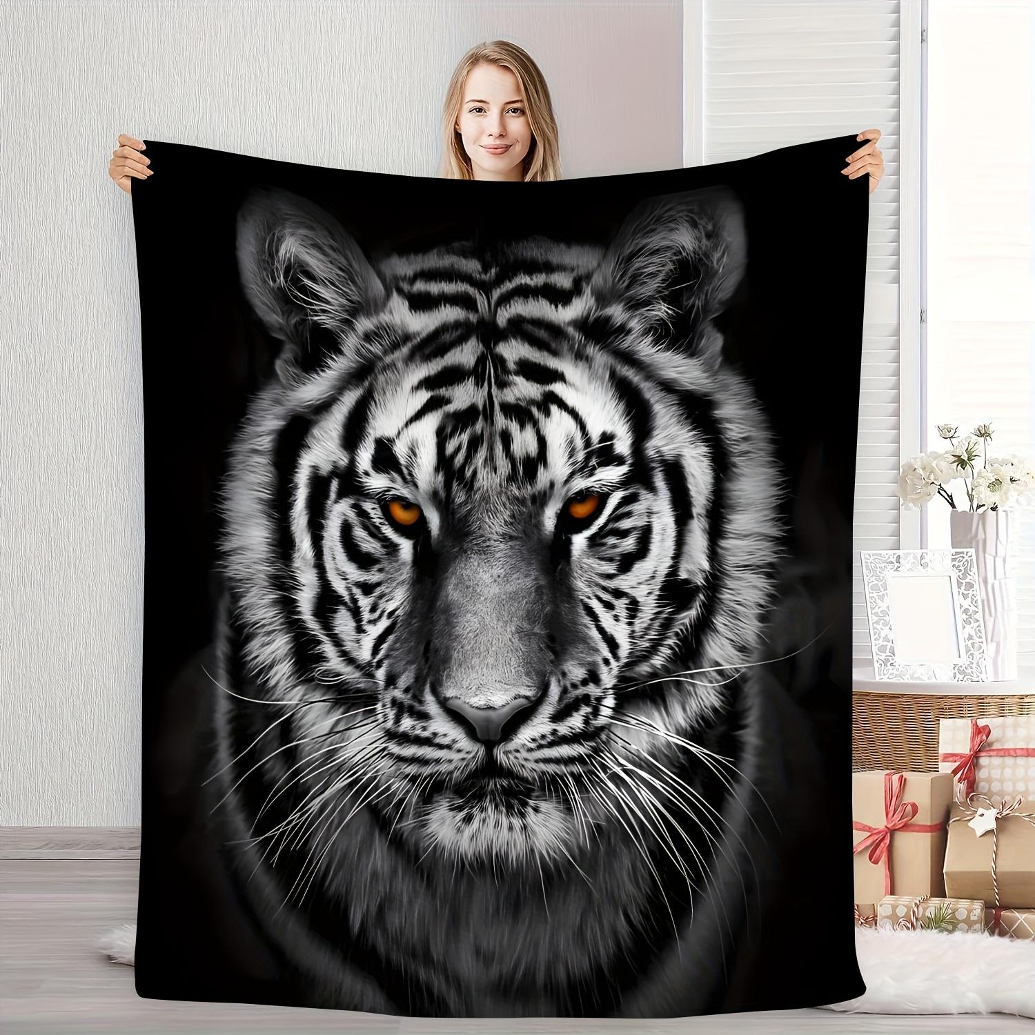 Black flannel blanket with lifelike white tiger pattern, showing wild charm and personality, perfect for family use 100x150cm
Black flannel blanket with lifelike white tiger pattern, showing wild charm and personality, perfect for family use 100x150cm
