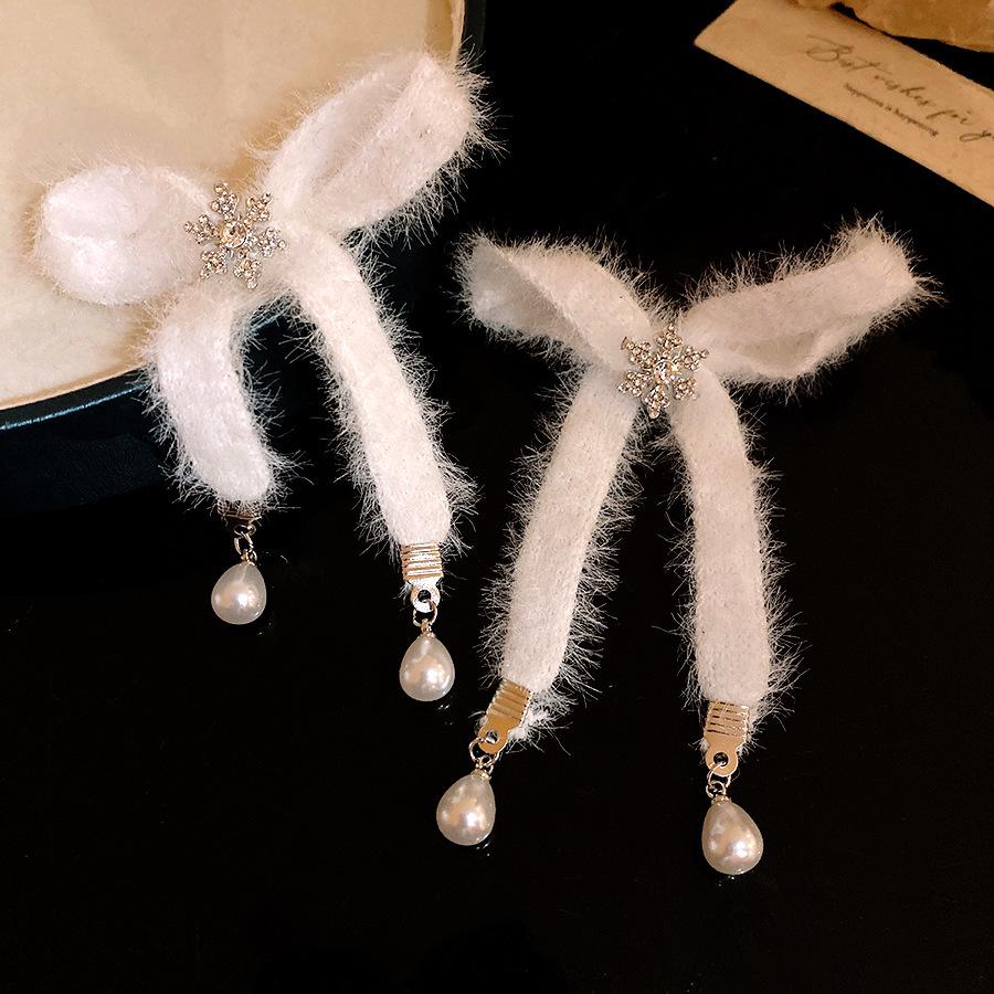 Silver Needle Snowflake Pearl Tassel Earrings - Elegant, High-End Bow Studs
Silver Needle Snowflake Pearl Tassel Earrings - Elegant, High-End Bow Studs
