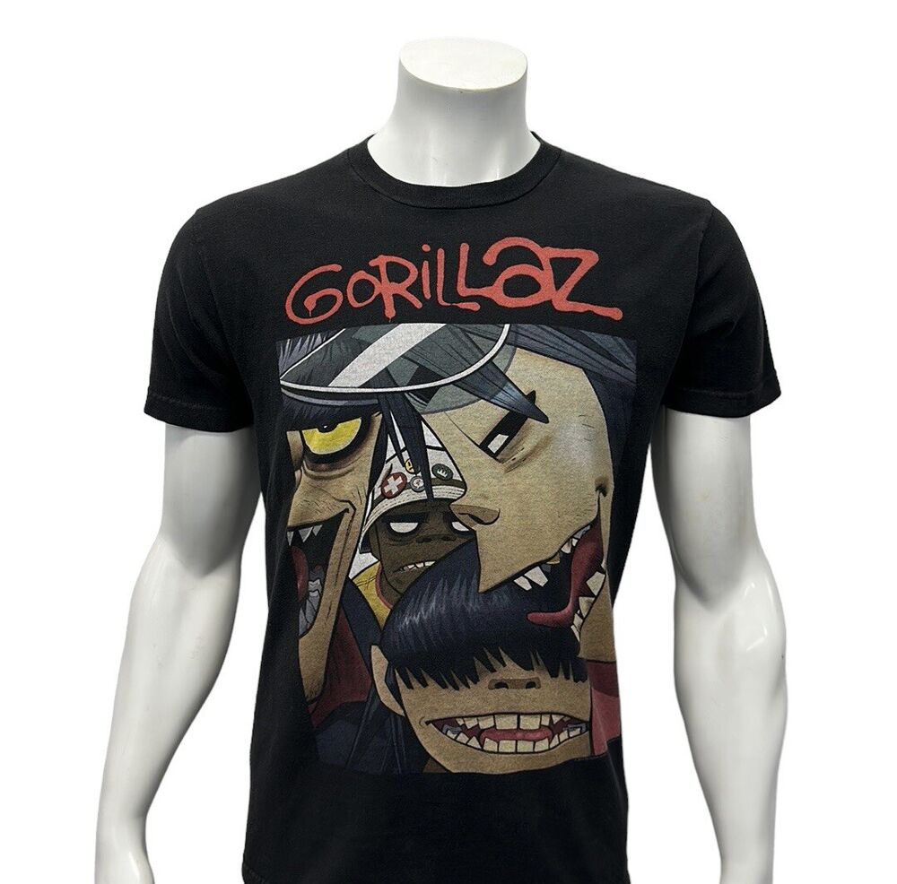 Редкая футболка Gorillaz из пластика с пляжным альбомом, черная футболка с графикой Tour Rock Techno Band Md унисекс
Редкая футболка Gorillaz из пластика с пляжным альбомом, черная футболка с графикой Tour Rock Techno Band Md унисекс