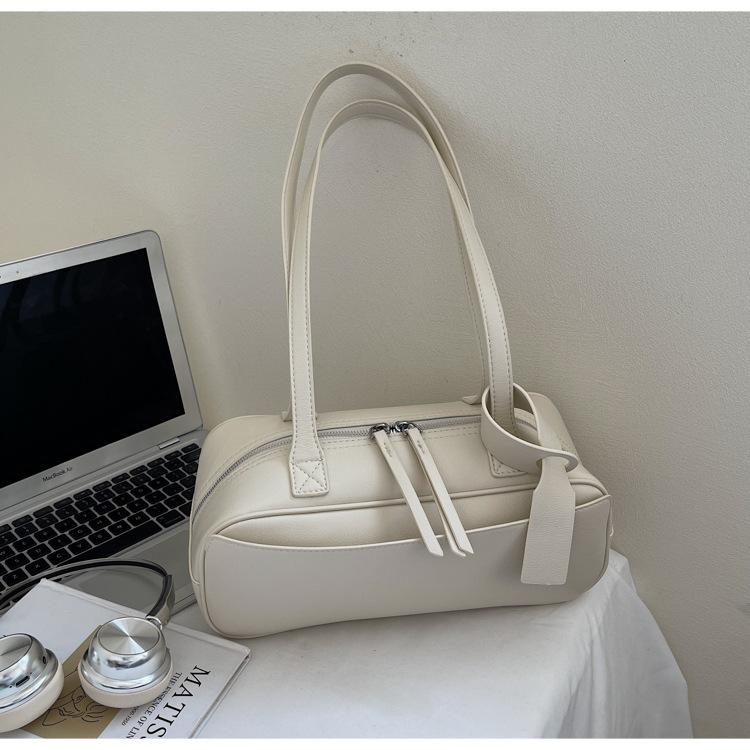 Niche retro textured bowling bag 2025 new large-capacity shoulder underarm bag minimalist double zipper handbag
Niche retro textured bowling bag 2025 new large-capacity shoulder underarm bag minimalist double zipper handbag