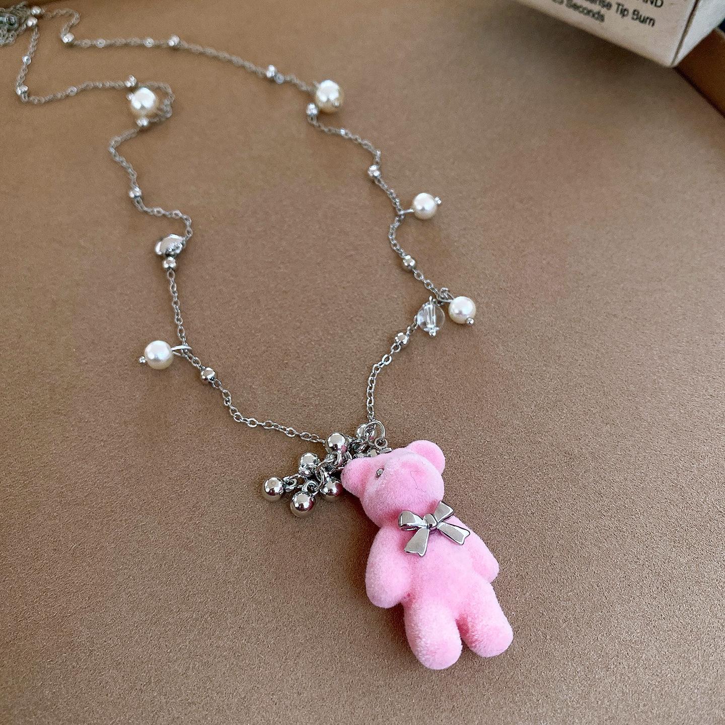 Autumn and winter flocking bear stainless steel pearl pendant sweater chain necklace cartoon creative necklace women
Autumn and winter flocking bear stainless steel pearl pendant sweater chain necklace cartoon creative necklace women