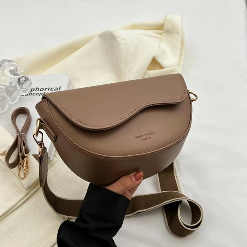 Women Vintage Solid Color Flap Small Saddle Shoulder Underarm Bag Fashi PU Leather Wide Strap Crossbody Bag світло-коричневого кольору
Women Vintage Solid Color Flap Small Saddle Shoulder Underarm Bag Fashi PU Leather Wide Strap Crossbody Bag світло-коричневого кольору