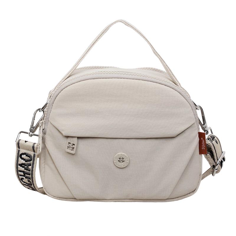 Chic Canvas Crossbody Bag: Lightweight, Stylish Round Design – Perfect for Shopping and Casual Outings.
Chic Canvas Crossbody Bag: Lightweight, Stylish Round Design – Perfect for Shopping and Casual Outings.