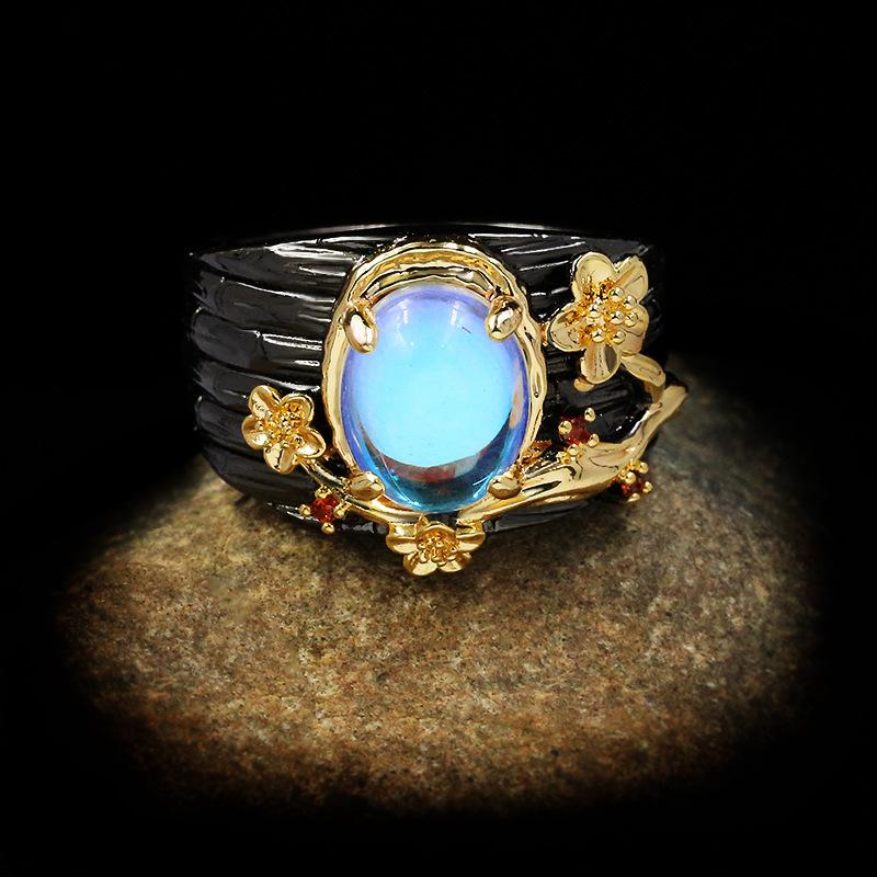 Bague en pierre précieuse au clair de lune pour dames, bijoux en or noir, Branche d arbre, fleur, ficelle, élégante, créative, nouveau
Bague en pierre précieuse au clair de lune pour dames, bijoux en or noir, Branche d arbre, fleur, ficelle, élégante, créative, nouveau