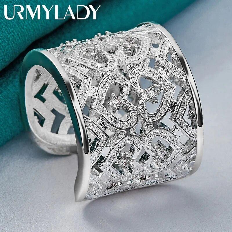 URMYLADY из стерлингового серебра 925 пробы с полым сердечком и цирконом, регулируемое кольцо для женщин, свадебное очарование, модные украшения для помолвки
URMYLADY из стерлингового серебра 925 пробы с полым сердечком и цирконом, регулируемое кольцо для женщин, свадебное очарование, модные украшения для помолвки