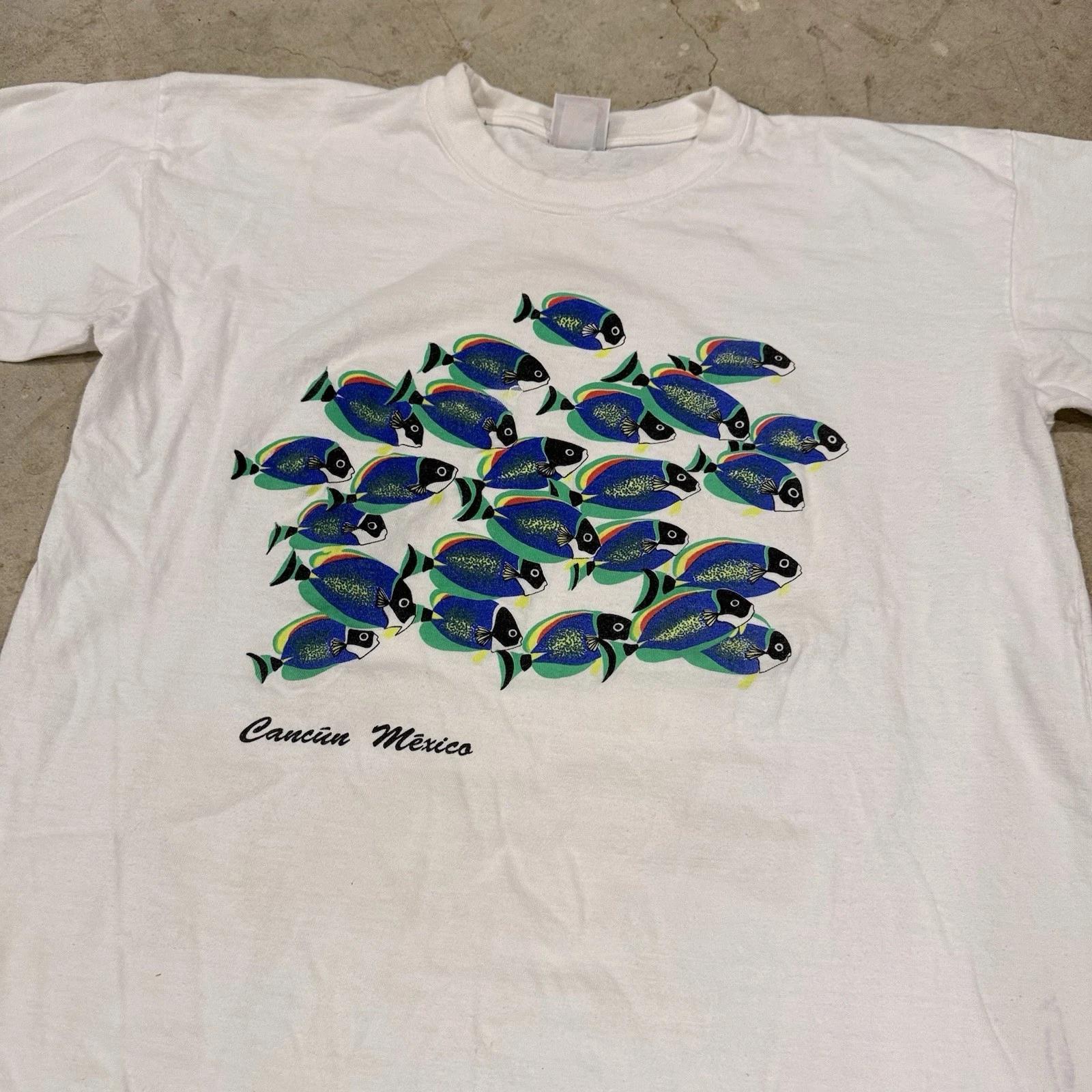 Vtg - Single Stitch Cancun Mexico Graphic Tee - School Of Fish Size M/L M
Vtg - Single Stitch Cancun Mexico Graphic Tee - School Of Fish Size M/L M