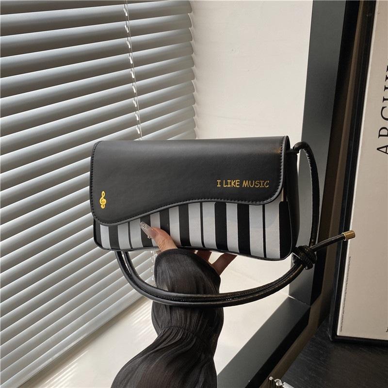 New Fashion Piano Keys Portable Small Square Bag Versatile Color Contrast Crossbody Women s Bag чёрный
New Fashion Piano Keys Portable Small Square Bag Versatile Color Contrast Crossbody Women s Bag чёрный