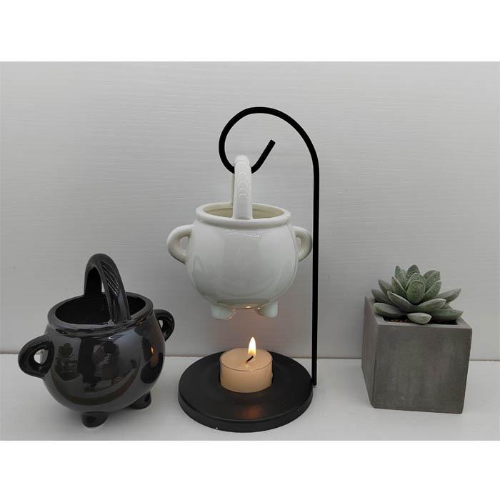 Керамическая аромалампа-капля с железным крючком и корзинкой для ведьминого зелья 10x10x19 cm чёрный
Керамическая аромалампа-капля с железным крючком и корзинкой для ведьминого зелья 10x10x19 cm чёрный