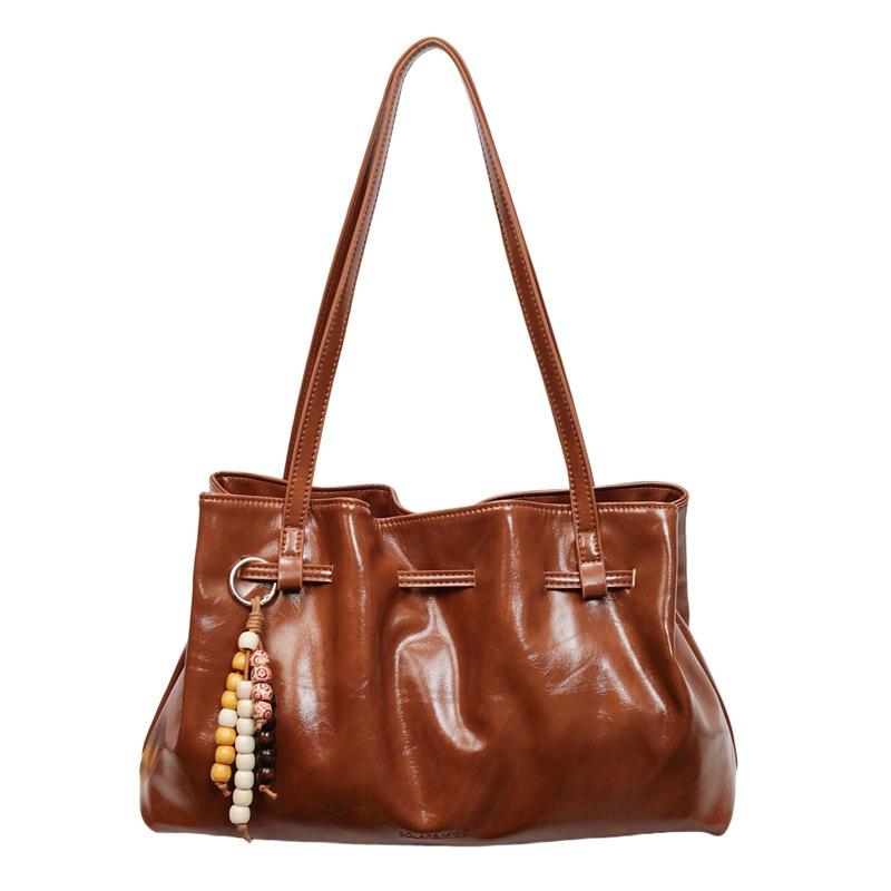 Simple casual shoulder tote bag 2025 autumn and winter new hand-held fashionable large-capacity portable commuter bag no pendant
Simple casual shoulder tote bag 2025 autumn and winter new hand-held fashionable large-capacity portable commuter bag no pendant