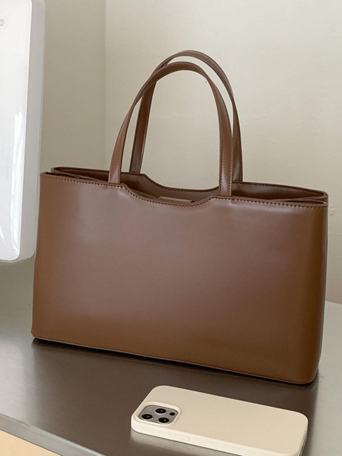 Tote Bag with Multiple Pockets, Simple Fashion Commuting Bag,Minimalist Design for Work and Class,Women Handbag
Tote Bag with Multiple Pockets, Simple Fashion Commuting Bag,Minimalist Design for Work and Class,Women Handbag