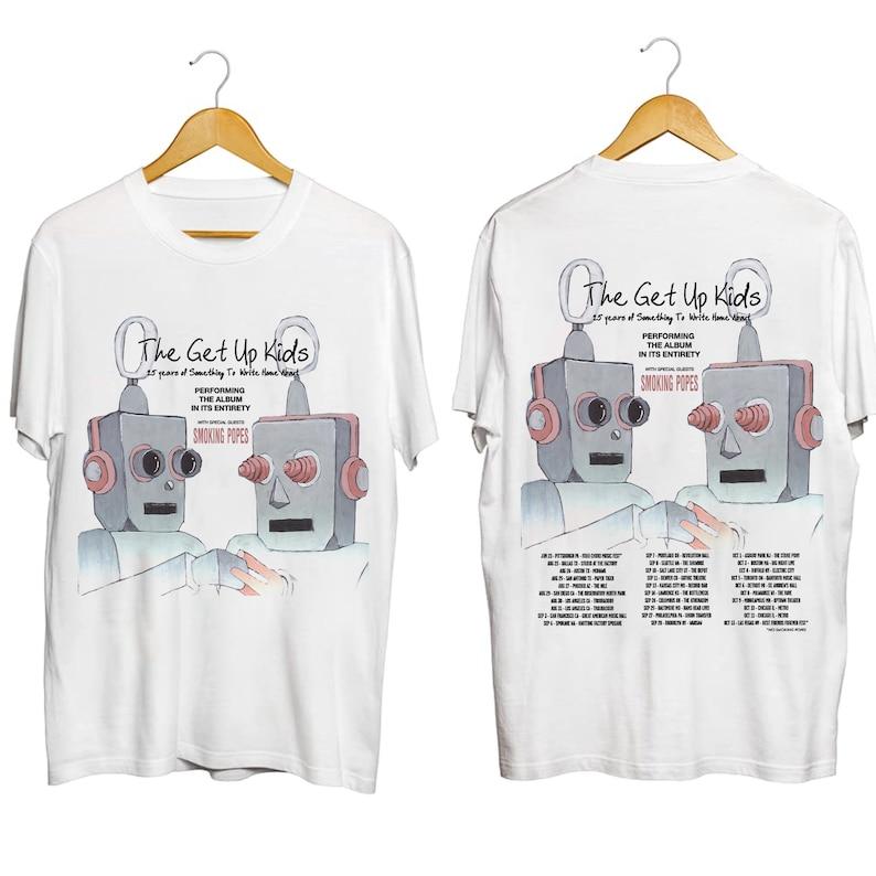 Футболка из плотного хлопка плотностью 300GSM The Get Up Kids — что-то, что можно написать домой Рубашка в честь 25-летия тура Футболка Get Up Kids Tour
Футболка из плотного хлопка плотностью 300GSM The Get Up Kids — что-то, что можно написать домой Рубашка в честь 25-летия тура Футболка Get Up Kids Tour
