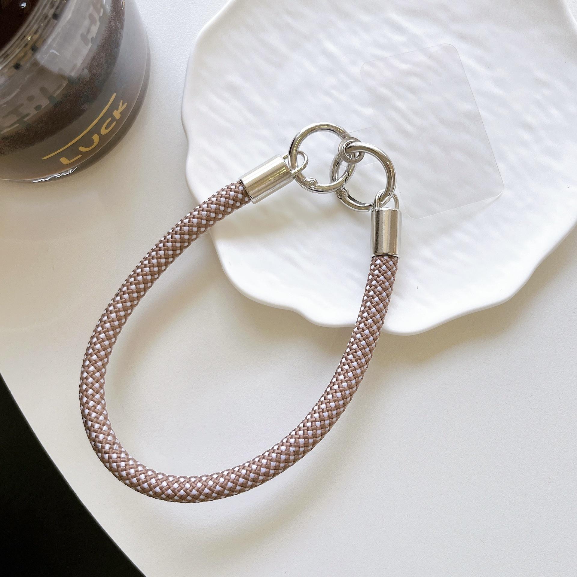 Universal Phone Case Lanyard: Versatile Silver Buckle Bracelet, Rope Woven Design, Bag Charm, Polaroid Holder.
Universal Phone Case Lanyard: Versatile Silver Buckle Bracelet, Rope Woven Design, Bag Charm, Polaroid Holder.