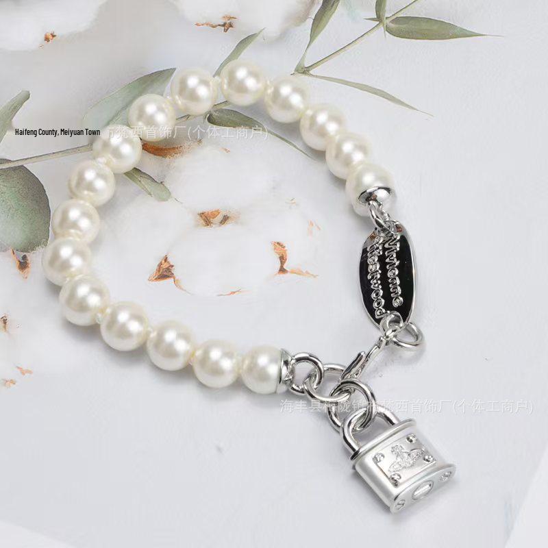 Empress Dowager Saturn Pearl Padlock Chain Necklace & Earrings - Punk Style for Women
Empress Dowager Saturn Pearl Padlock Chain Necklace & Earrings - Punk Style for Women