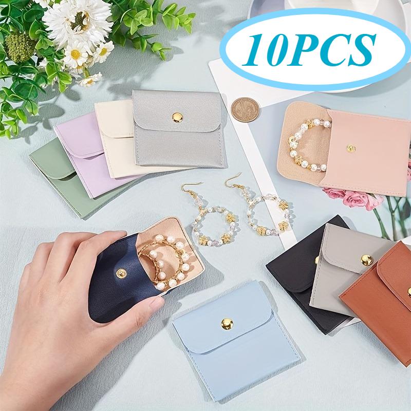 10pcs Faux Leather Jewelry Pouches, Assorted Colors Snap Closure Bags for Rings, Pendants, Necklaces - Perfect Storage Solution
10pcs Faux Leather Jewelry Pouches, Assorted Colors Snap Closure Bags for Rings, Pendants, Necklaces - Perfect Storage Solution