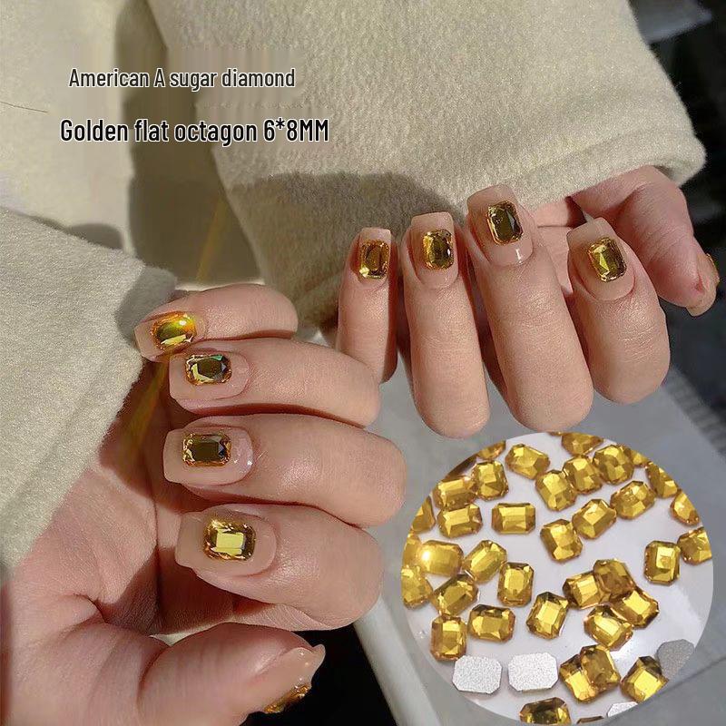 Gold Octagon Rhinestone Nail Accessories - Shiny Sugar Cube Jewelry for Manicures
Gold Octagon Rhinestone Nail Accessories - Shiny Sugar Cube Jewelry for Manicures