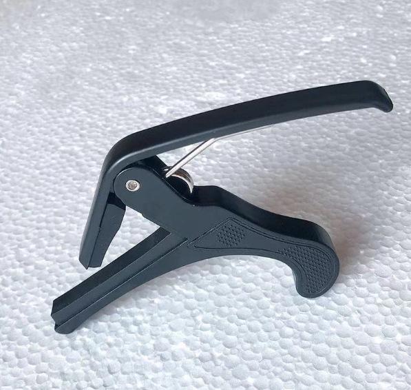 Multi-Functional Zinc Alloy Capo for Electric, Wood, Folk & Classical Guitars and Ukuleles
Multi-Functional Zinc Alloy Capo for Electric, Wood, Folk & Classical Guitars and Ukuleles