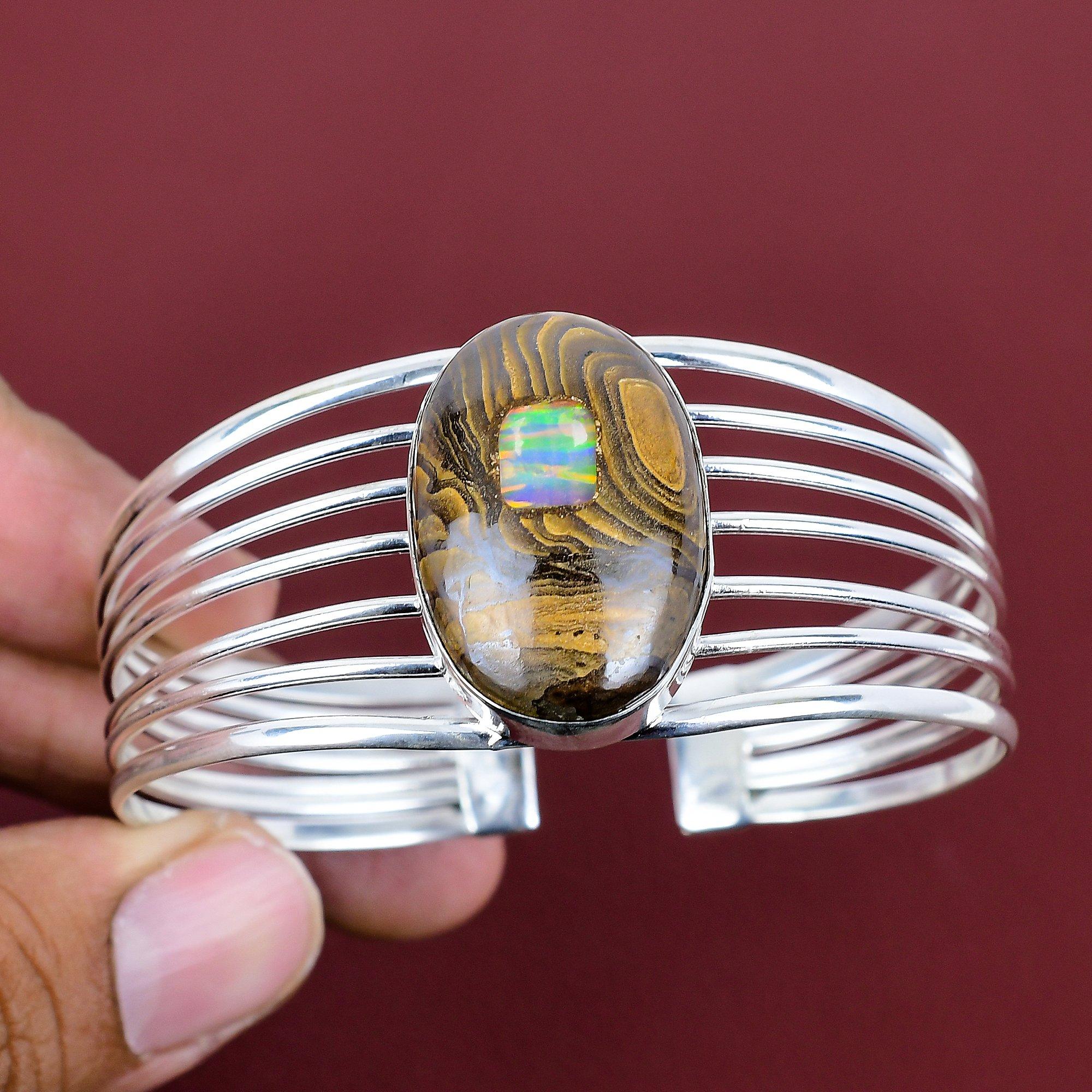 Ethopian opal in boulder opal bangle 925 sterling silver cuff bracelet adjustable bangle gemstone jewelry for gifts handmade designer bangle Adjustable
Ethopian opal in boulder opal bangle 925 sterling silver cuff bracelet adjustable bangle gemstone jewelry for gifts handmade designer bangle Adjustable