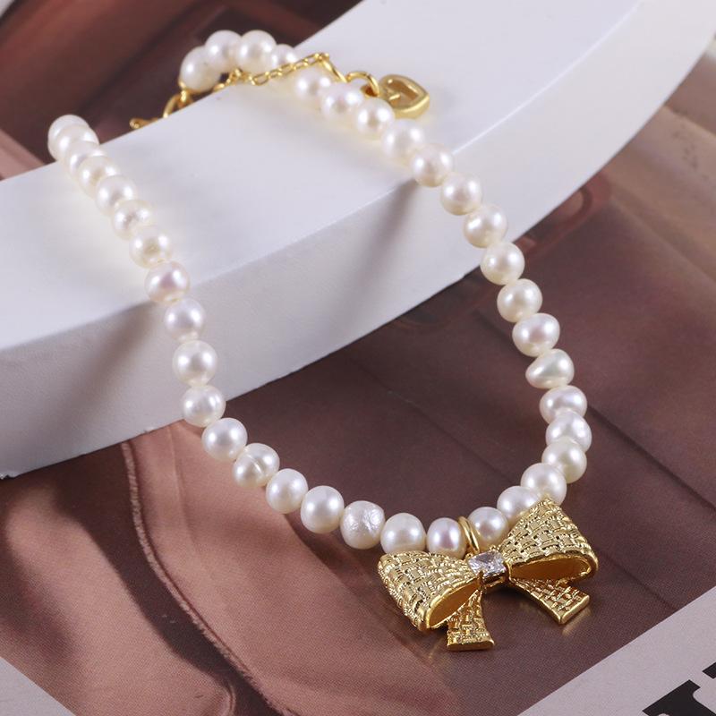 European And American Jewelry Wholesale Sweet Freshwater Rice Grain Small Pearl Fashion Bow Elegant Gentle Bracelet Bracelet
European And American Jewelry Wholesale Sweet Freshwater Rice Grain Small Pearl Fashion Bow Elegant Gentle Bracelet Bracelet