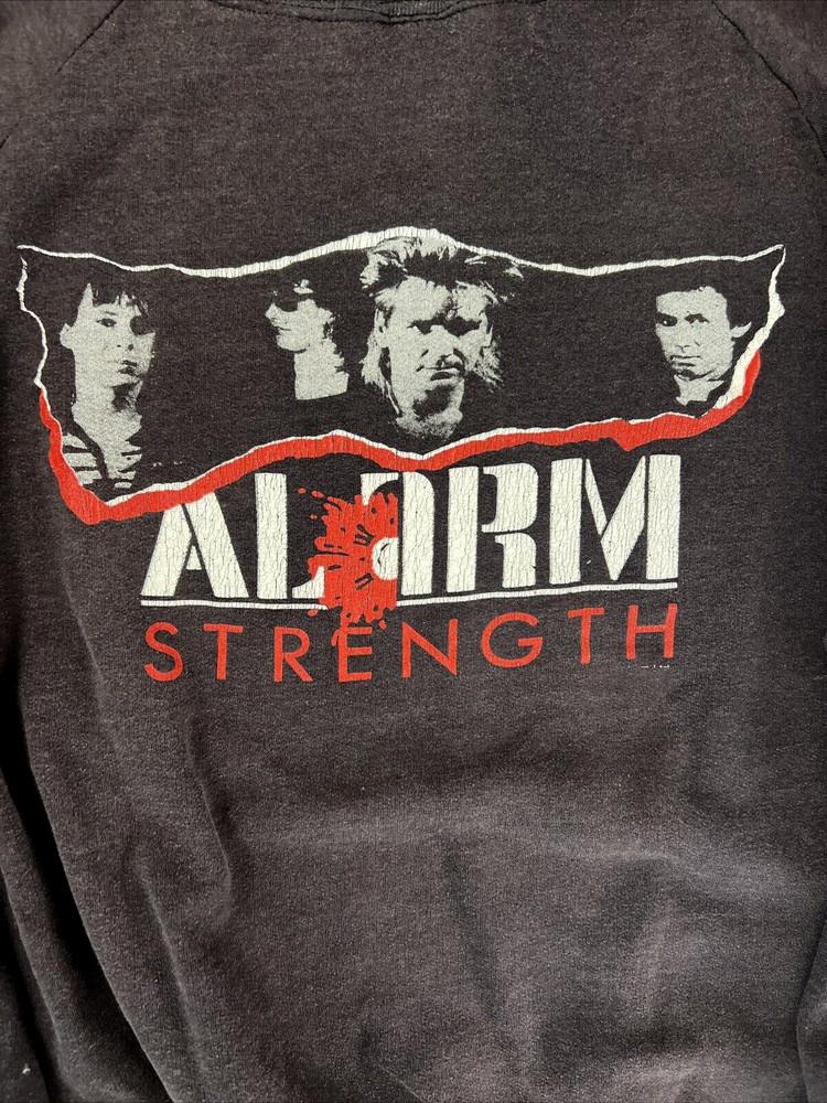 Vtg The Alarm Strength UK Punk Rock Band Unisex T-Shirt All Size 4XL
Vtg The Alarm Strength UK Punk Rock Band Unisex T-Shirt All Size 4XL