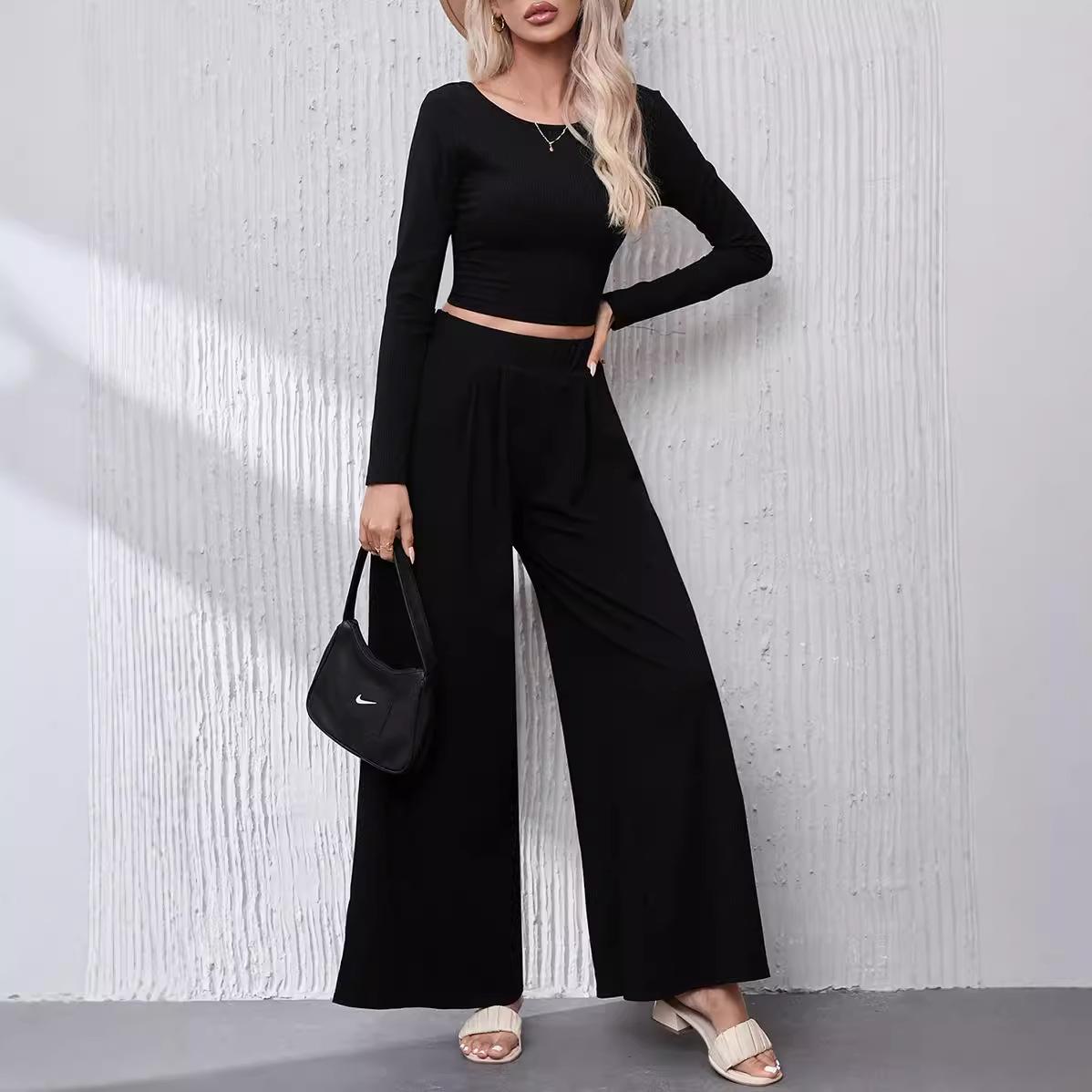 European Fashion Ribbed Knit Women s Two-Piece Set: Round Neck Long Sleeve Top & Wide Leg Pants L чорний
European Fashion Ribbed Knit Women s Two-Piece Set: Round Neck Long Sleeve Top & Wide Leg Pants L чорний