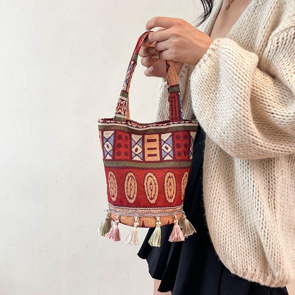 Large Capacity Tassel Cloth Bag Bohemian Bucket Bag Ethnic Style Canvas Bag Grocery Handbags style 1
Large Capacity Tassel Cloth Bag Bohemian Bucket Bag Ethnic Style Canvas Bag Grocery Handbags style 1