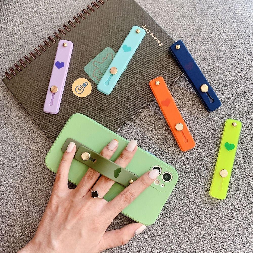 Anti-slip Phone Finger Grip Strap Silicone Phone Ring Stand Wrist Band Phone Holder Smartphones
Anti-slip Phone Finger Grip Strap Silicone Phone Ring Stand Wrist Band Phone Holder Smartphones