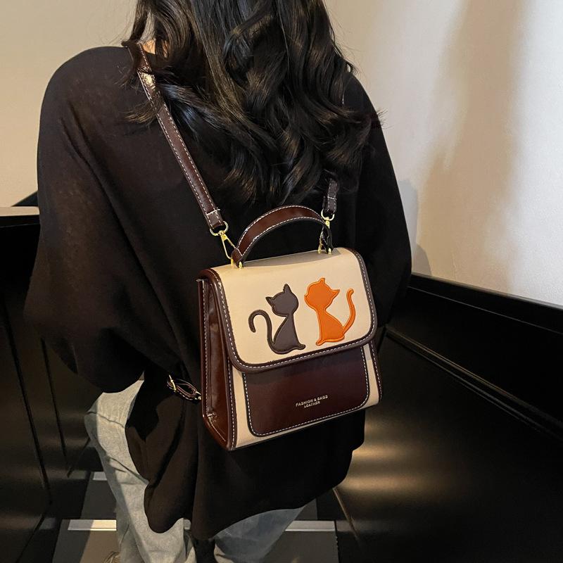 Niche cat woman double bag women s new fashionable large-capacity urban portable small backpack
Niche cat woman double bag women s new fashionable large-capacity urban portable small backpack