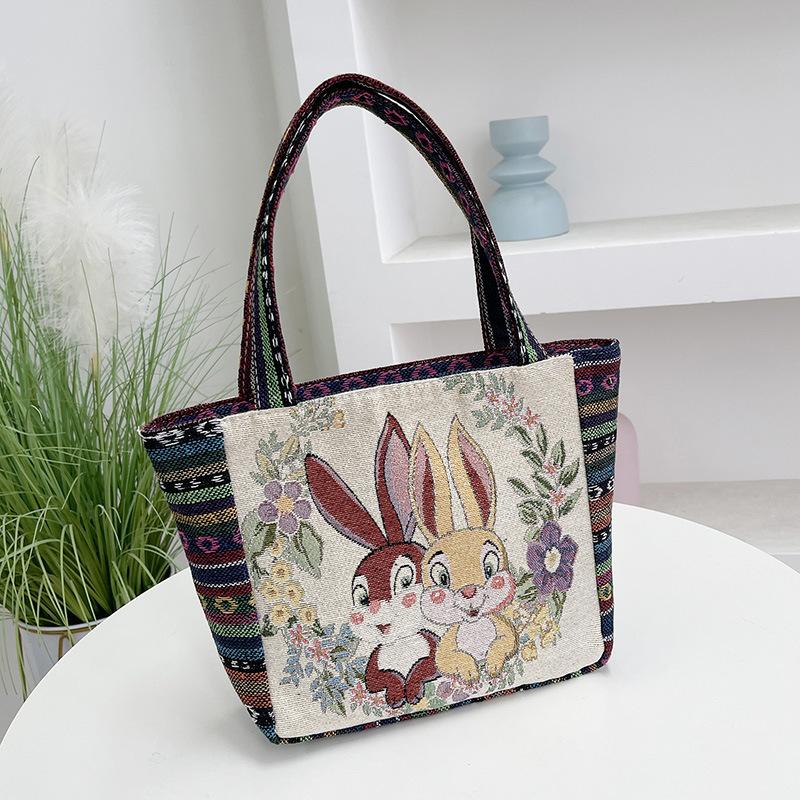 Rabbit embroidered canvas handbag women s handbag casual handbag office worker small satchel
Rabbit embroidered canvas handbag women s handbag casual handbag office worker small satchel