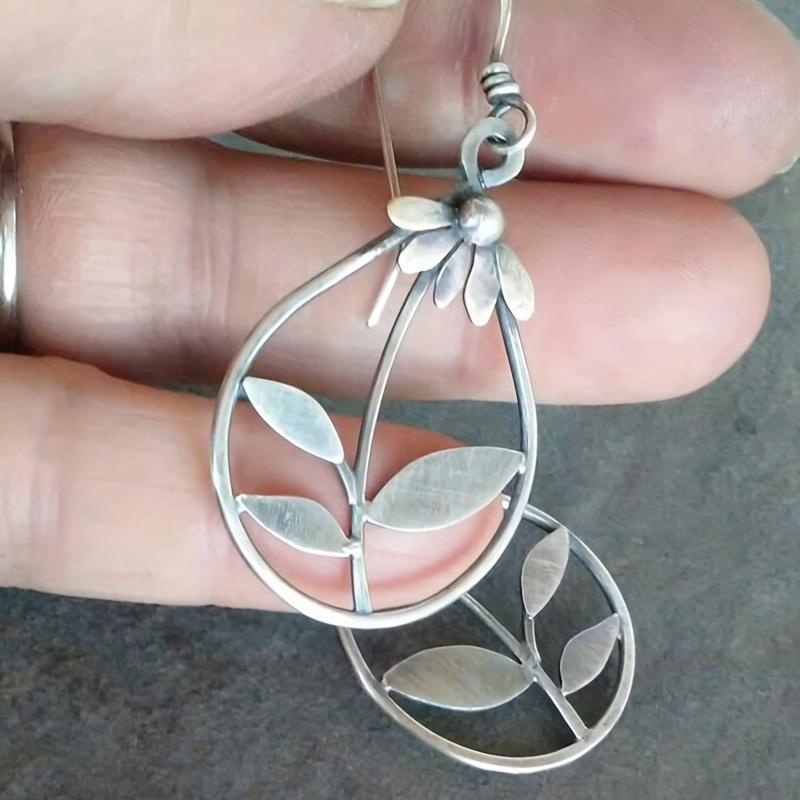 Exquisite Water Drop Flower Leaf Dangle Earrings - Zinc Alloy, Silver Plated, Retro Style, Hollow Design, Lightweight, Durable, Perfect for Women
Exquisite Water Drop Flower Leaf Dangle Earrings - Zinc Alloy, Silver Plated, Retro Style, Hollow Design, Lightweight, Durable, Perfect for Women