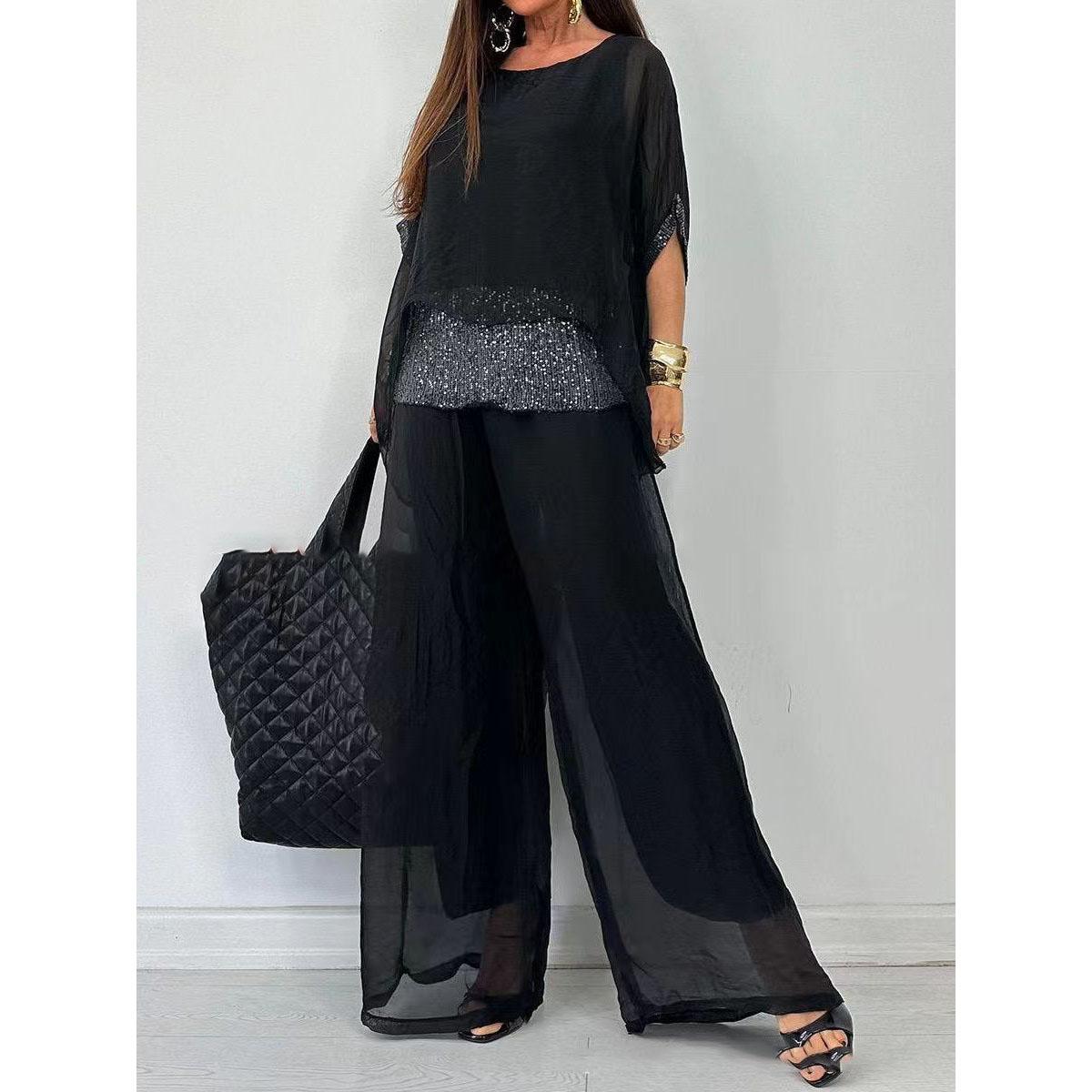 Жіночий літній костюм з блискітками та широкими штанами, модний суцільний шифоновий костюм, повсякденний круглий виріз, рукави летюча миша , з блискітками, широкі штани XXL чорний
Жіночий літній костюм з блискітками та широкими штанами, модний суцільний шифоновий костюм, повсякденний круглий виріз, рукави летюча миша , з блискітками, широкі штани XXL чорний