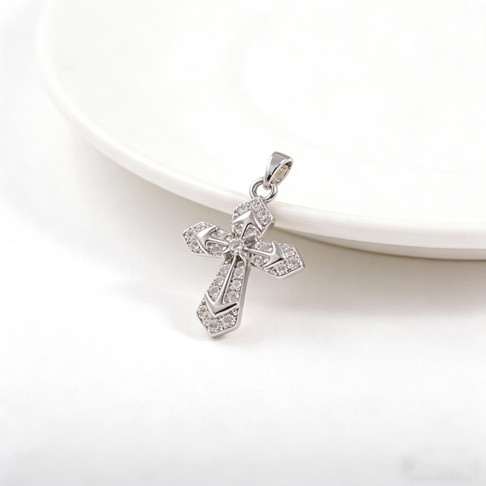 Stylish Rhinestone Cross Pendant with Floral Pattern and Zirconia Inlay
Stylish Rhinestone Cross Pendant with Floral Pattern and Zirconia Inlay