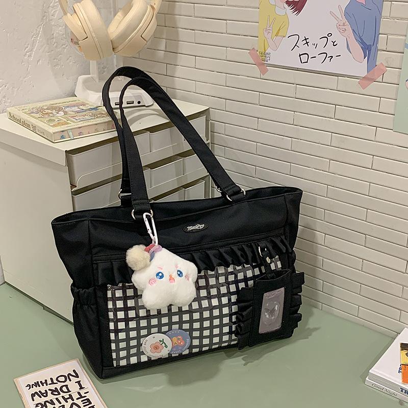 Japanese cute plaid pain bag ins style fashionable large-capacity tote bag portable shoulder bag large-capacity bar bag single bag (send badges and cards) чорний
Japanese cute plaid pain bag ins style fashionable large-capacity tote bag portable shoulder bag large-capacity bar bag single bag (send badges and cards) чорний