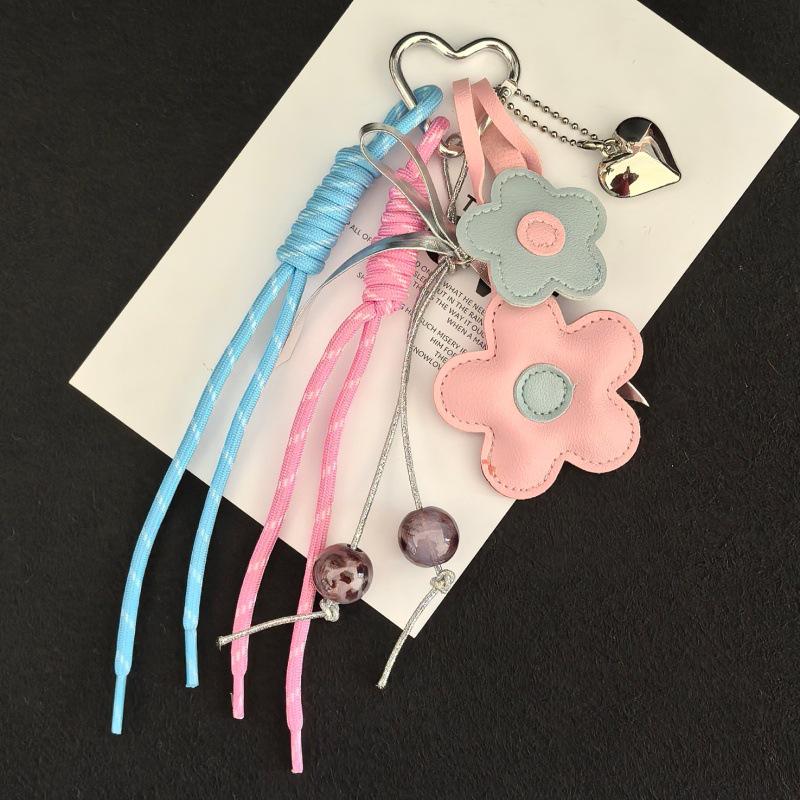 MIU Leather Flower Tassel Keychain with Beads - Korean Style Keychain Charm
MIU Leather Flower Tassel Keychain with Beads - Korean Style Keychain Charm