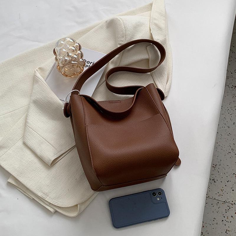 Женская сумка-ведро большой вместимости с широким плечевым ремнем - Идеально подходит для поездок на работу осенью и зимой кофейный
Женская сумка-ведро большой вместимости с широким плечевым ремнем - Идеально подходит для поездок на работу осенью и зимой кофейный