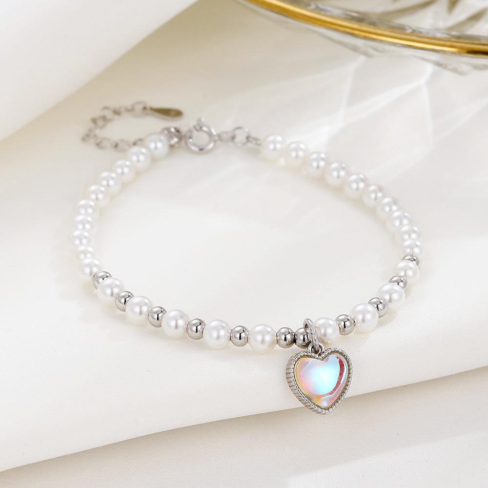 Elegant S925 Sterling Silver Heart & Pearl Bracelet with Moonlight Charm: A Stylish, Luxurious Accessory for Women. 925 Sterling Silver
Elegant S925 Sterling Silver Heart & Pearl Bracelet with Moonlight Charm: A Stylish, Luxurious Accessory for Women. 925 Sterling Silver