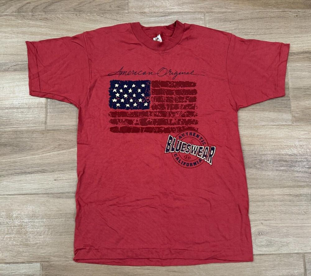 Vintage 80s Men039;s American Flag T-Shirt LARGE Red Blueswear Single Stitch USA Unisex T-Shirt S
Vintage 80s Men039;s American Flag T-Shirt LARGE Red Blueswear Single Stitch USA Unisex T-Shirt S
