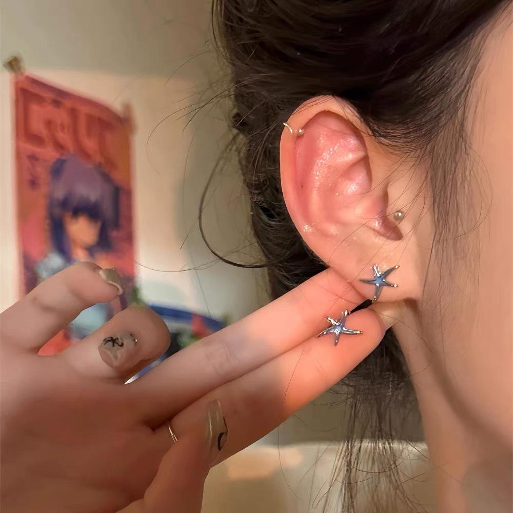 New simple and small blue starfish stud earrings for women s design niche earrings, colored enamel star earrings.
New simple and small blue starfish stud earrings for women s design niche earrings, colored enamel star earrings.